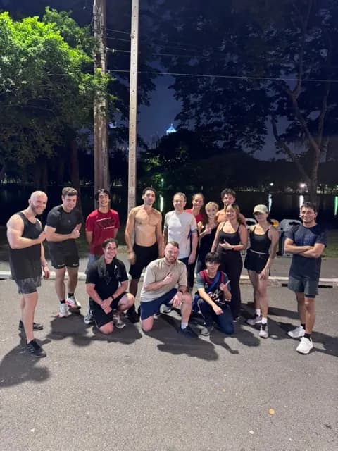 Evening running group meetup in Lumphini Park